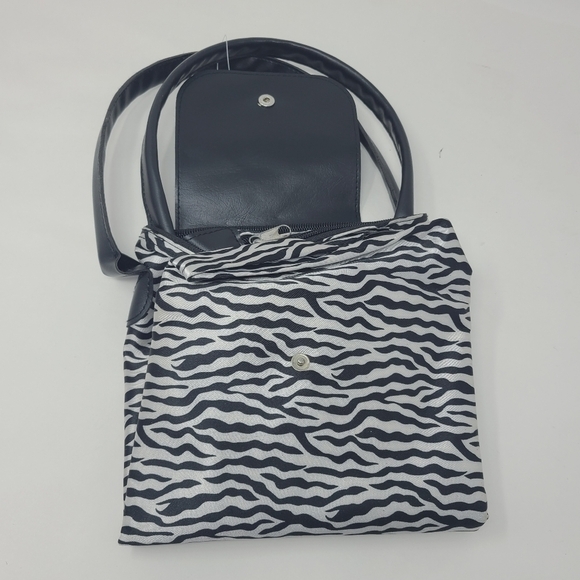 Ashley Stewart | Women's Three-in-One Animal Print Small Handbag to Tote Bag - Picture 3 of 8